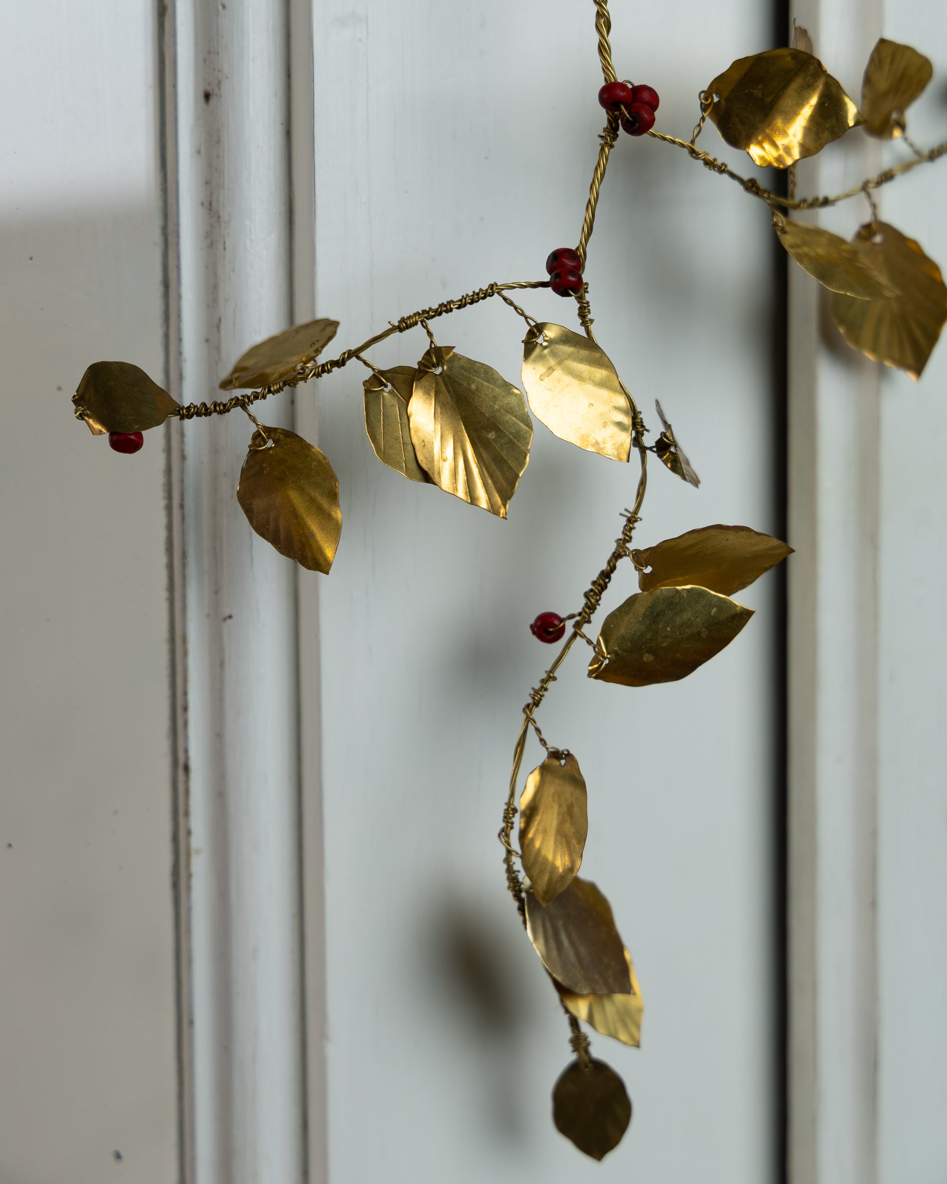 Misteltein med røde treperler