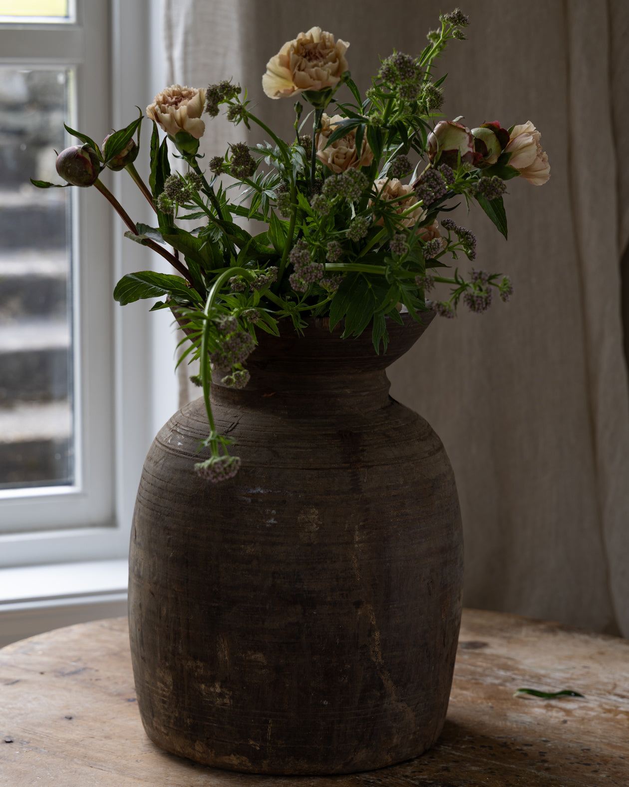 trekrukke-med-blomster-oppi