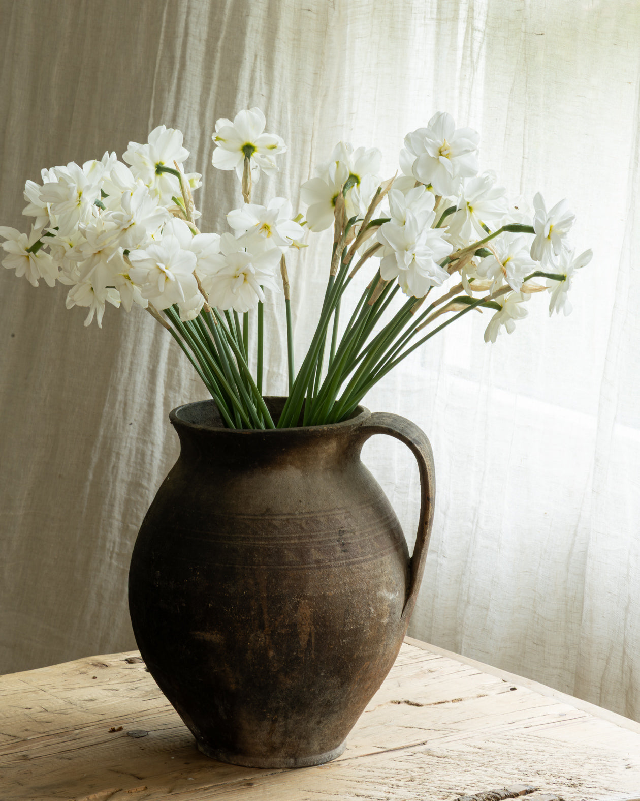 krukke-med-blomster