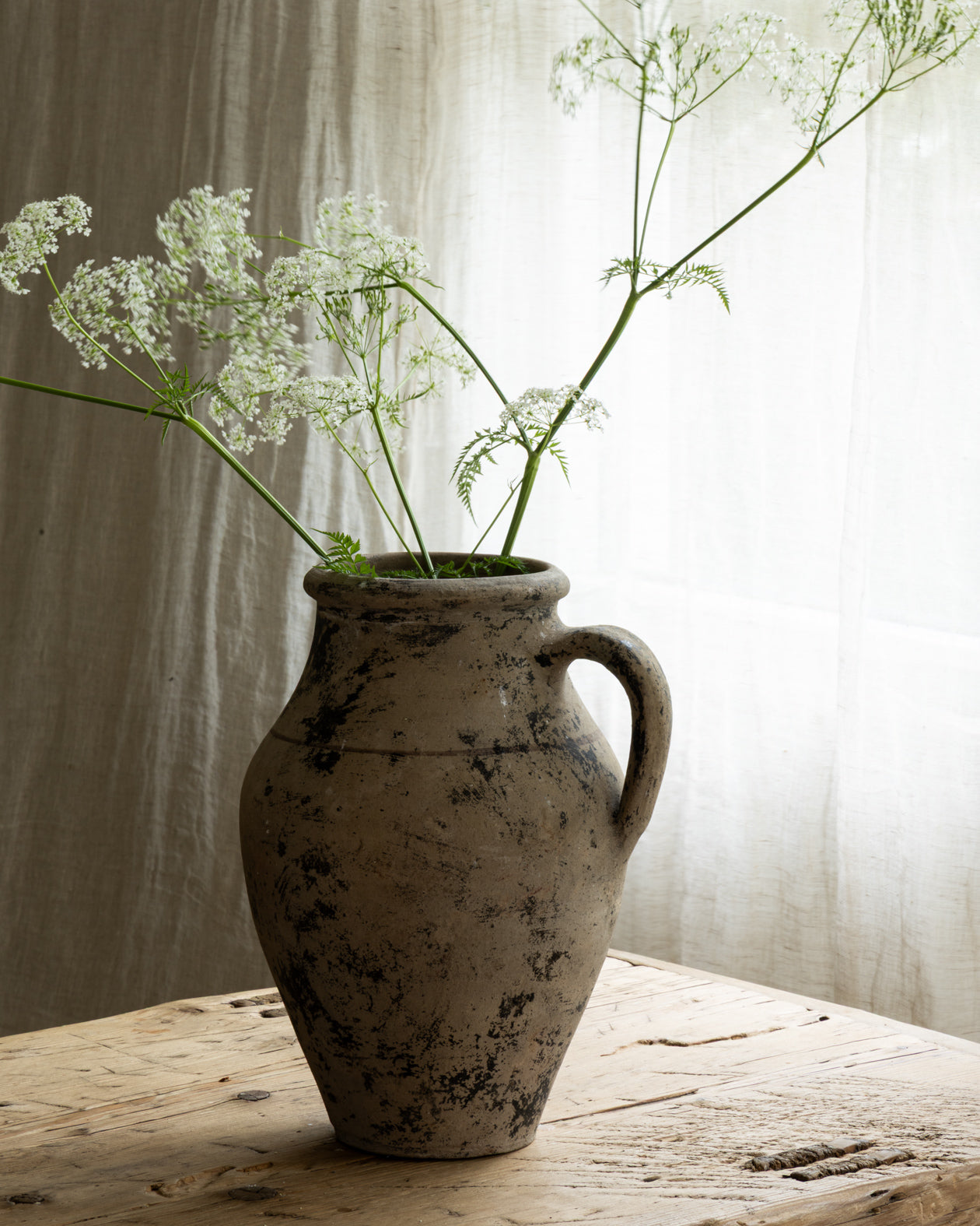krukke-med-blomster