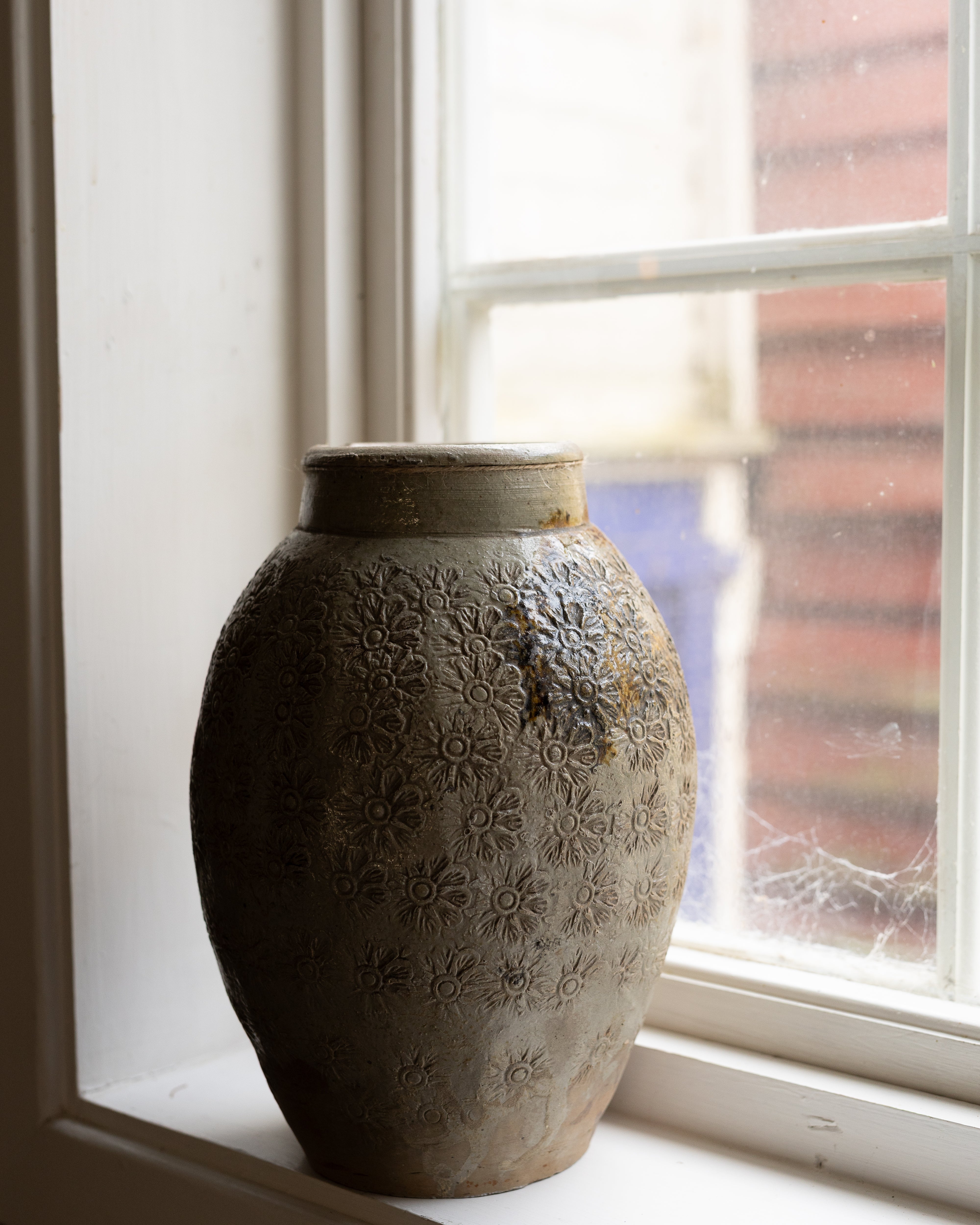 blomstervase-i-vinduskarm