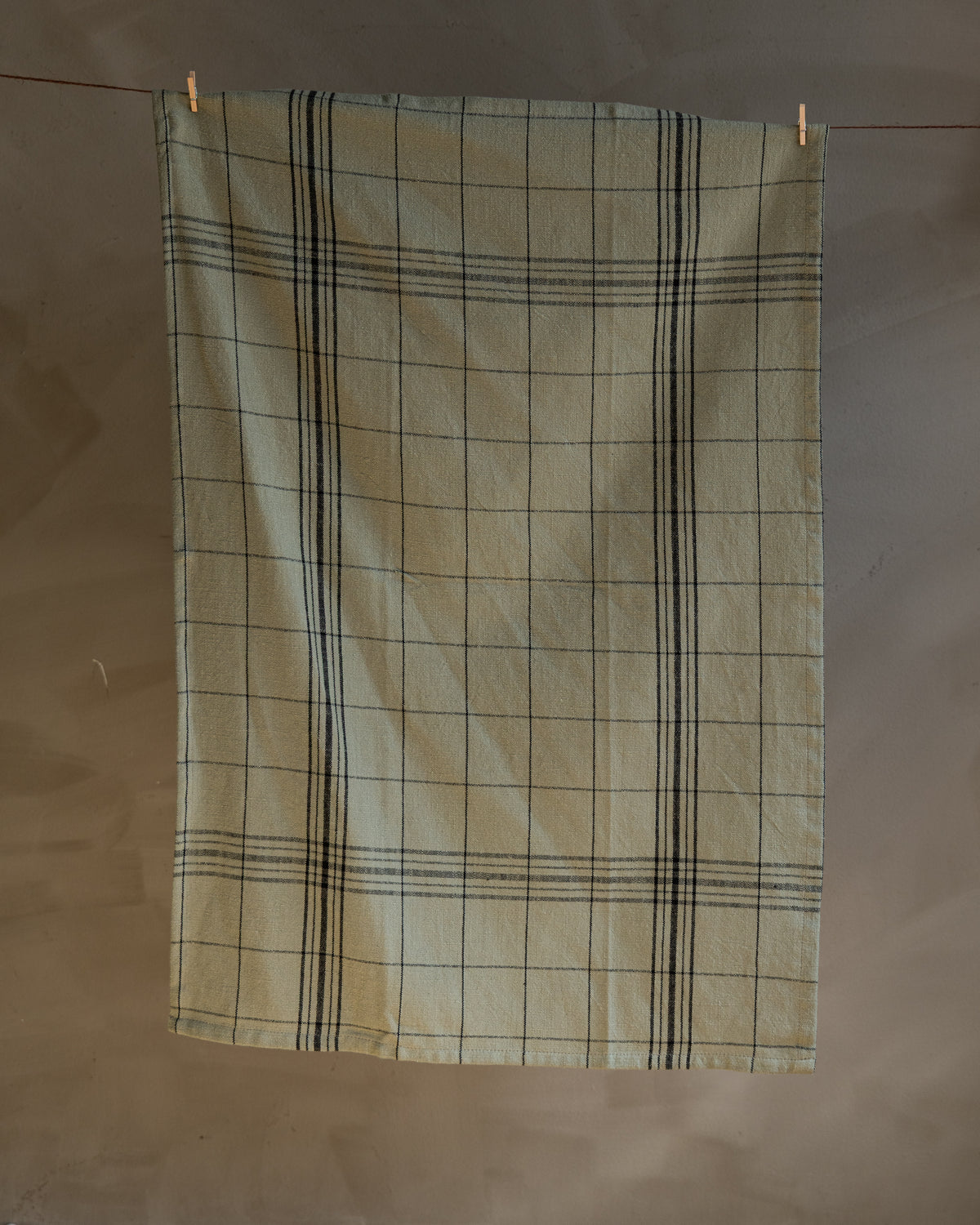 koppehandkle-hengende-fra-snor
